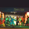 Persone in costume sul palco di Pinocchio.